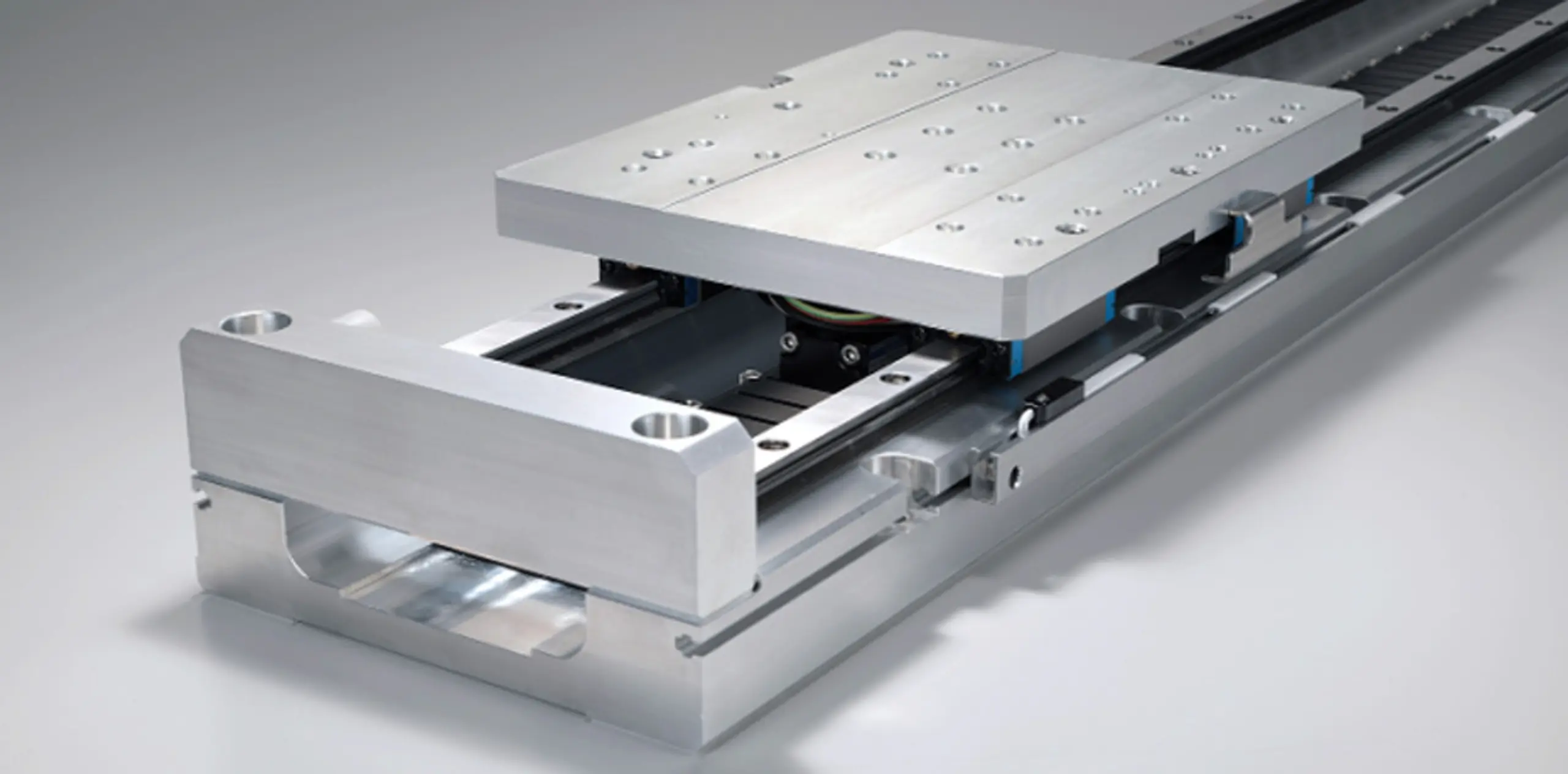 High-Thrust Direct Drive Linear Motor Positioning Stages Offer Long Stroke Lengths in a Compact Unit
