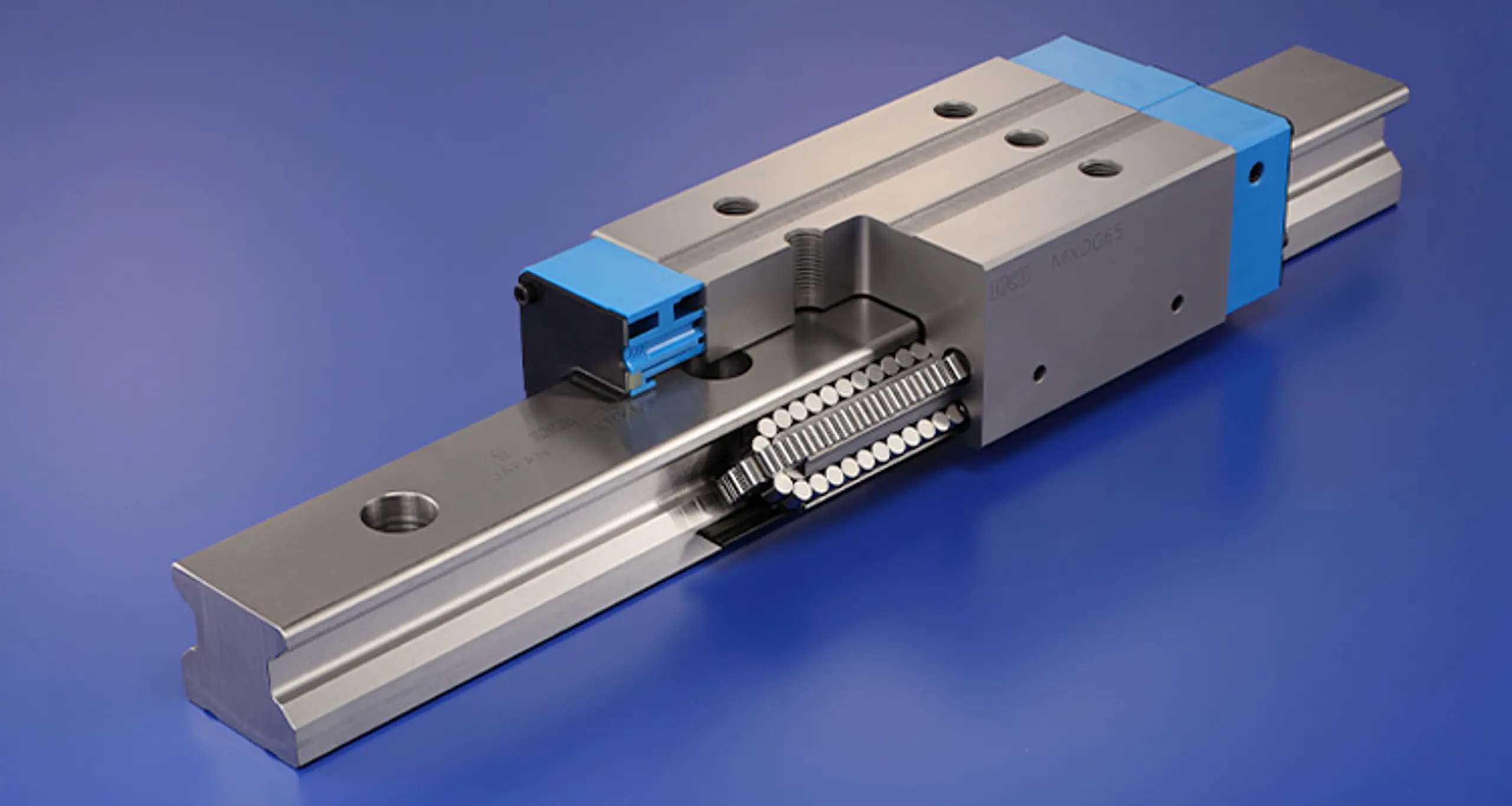 Rolling-type linear motion guides feature four rows of cylindrical rollers arranged in parallel, making contact over a large area on the raceway to provide high load capacity, ultra-smooth motion, high accuracy and rigidity.