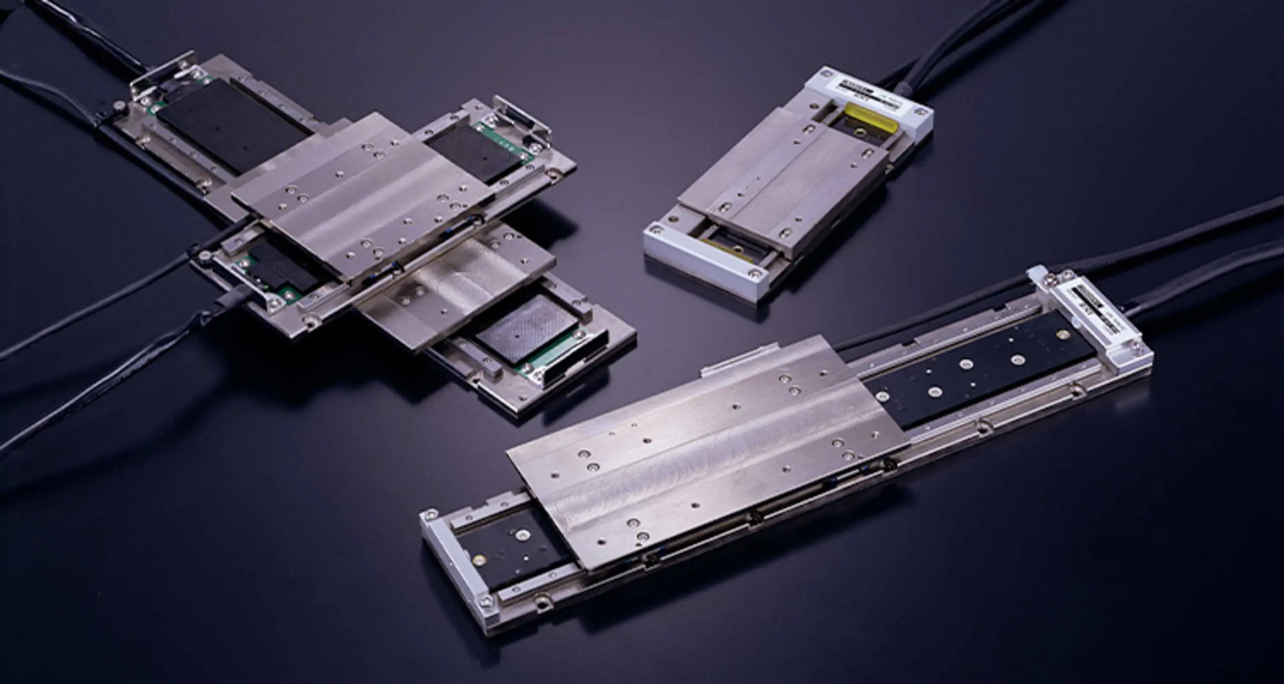 Ultra-compact linear motor-driven positioning stages can have dimensions as small as 11 millimeters in sectional height, 38 millimeters in width and 62 millimeters in length.